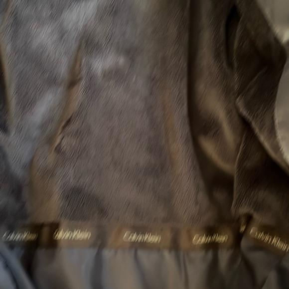 New without tags Calvin Klein puffer jacket. Gray/size large. - Picture 9 of 11